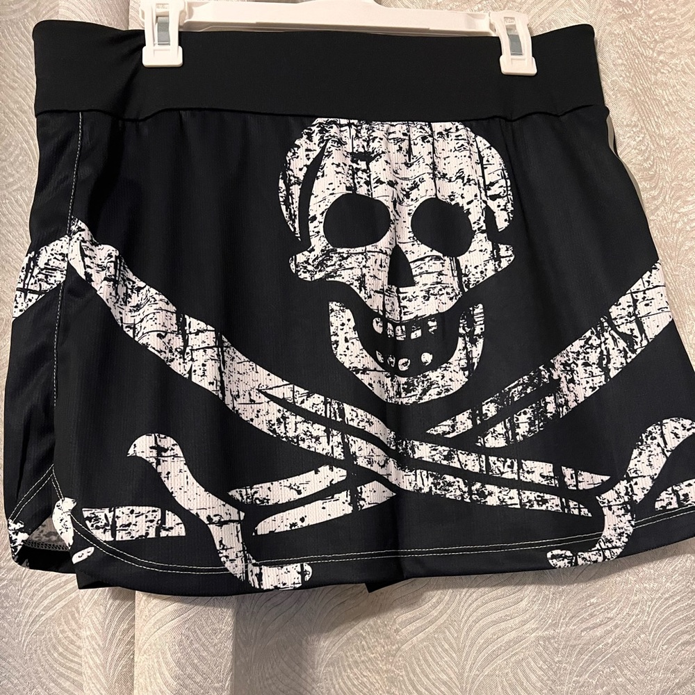 Black skull and crossbones mini skirt with built in shorts
